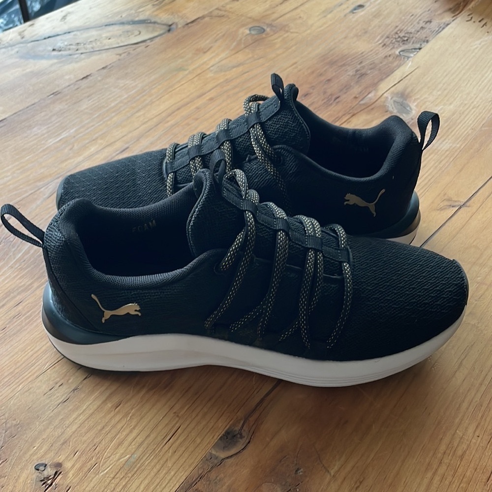 PUMA-8.5 women’s- black and gold soft foam sneaker